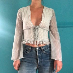 The East Order Checkered Blouse.